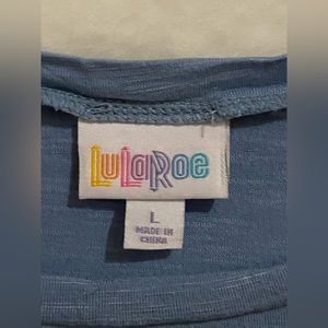 Lularoe tulip sleeve top.